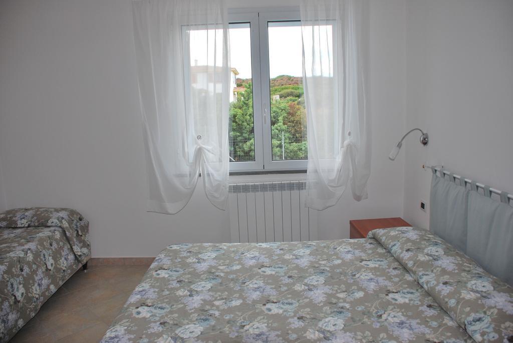 La Casa Dei Sogni Villa Portoscuso Bagian luar foto