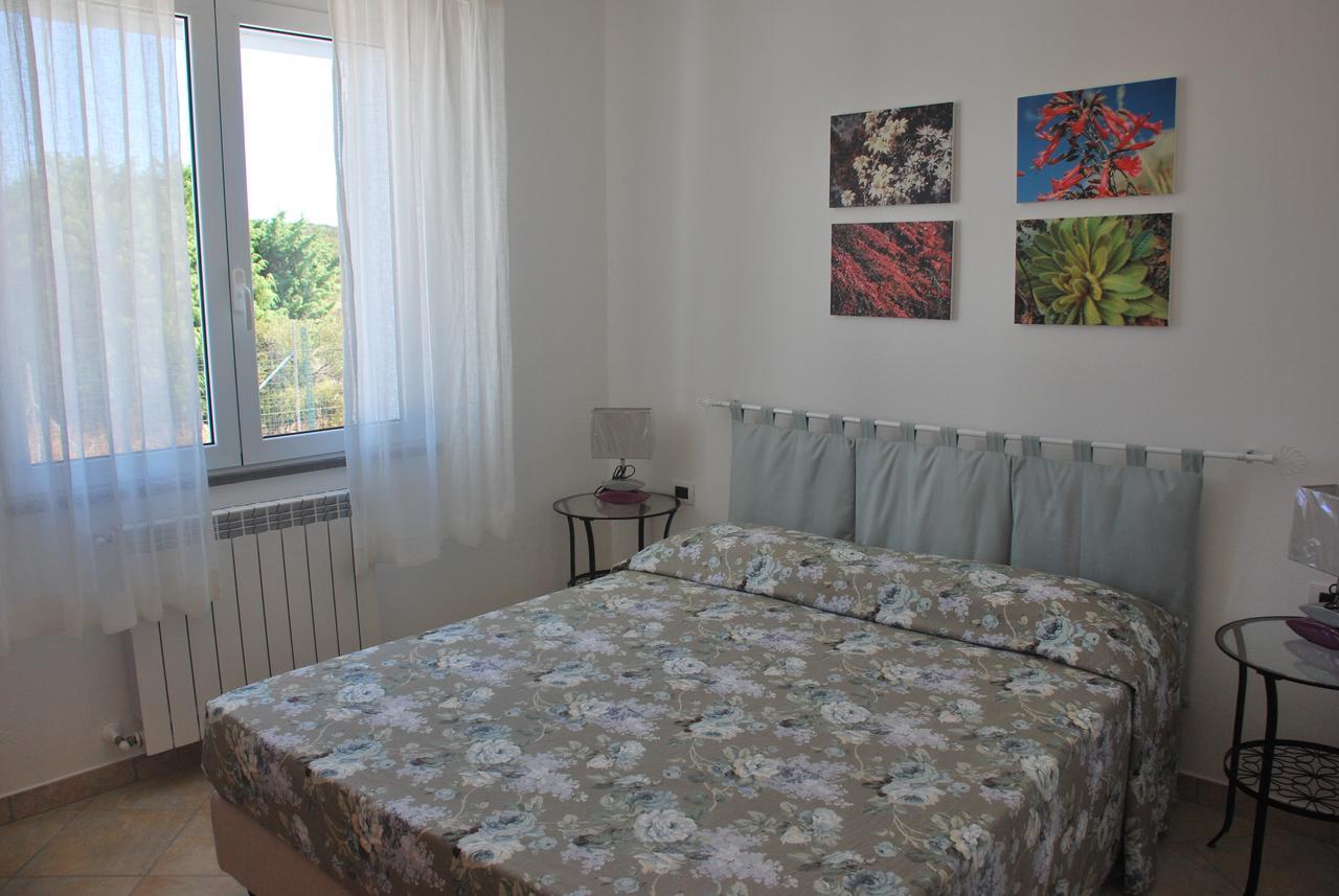 La Casa Dei Sogni Villa Portoscuso Bagian luar foto