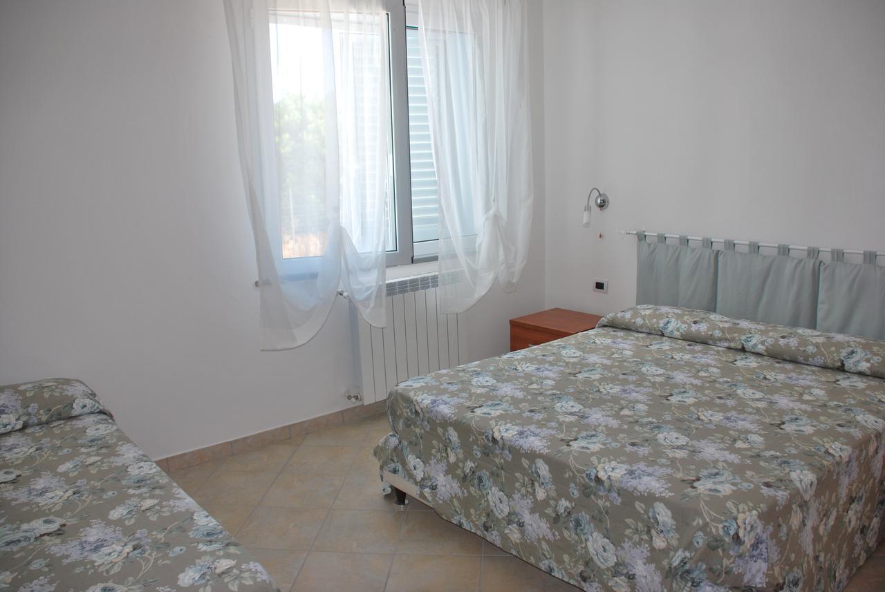 La Casa Dei Sogni Villa Portoscuso Bagian luar foto